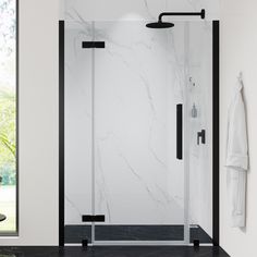 a bathroom with a walk in shower next to a white wall and black trimming