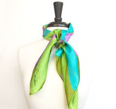 "Size: 30\" x 30\" Colors: Pierre Cardin JEUNESSE vibrant graphic daisy silk scarf, olive green, pink, lime and aqua Material: silk twill Condition: Excellent Hem: hand-rolled Make: Pierre Cardin Made in France Pierre Cardin Signature in the corner. Part of the Jeuness youth line. See all our Pierre Cardin scarves: https://etsy.me/2YKJUk4 All scarves in this shop are hand-washed in organic biodegradable soap with organic lemon oil and sometimes vinegar in cold water and pressed on a cool iron se Green Chic Silk Scarves, Chic Green Silk Scarves, Chic Green Silk Scarf For Spring, Chic Green Silk Scarf Gift, Chic Green Silk Scarf For Gift, Green Scarf As Spring Gift, Green Scarf For Spring Gift, Chic Green Scarf For Gift, Green Scarves For Spring Gift