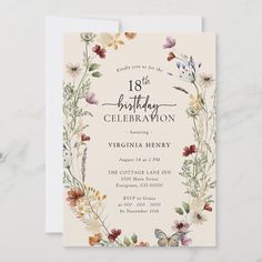 an elegant floral bridal shower card with watercolor flowers and butterflies on the front