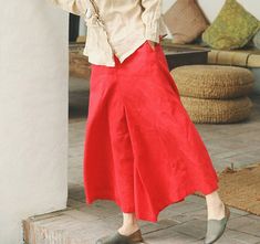 ★ Material: 100% Linen★ Model Size:-- Model wear size M-- Model is 170 cm / 5'8"-- Model measurements (bust 31" / waist 26" / hips 36" )★ In order to make it more suitable for you. please tell me your body measurements :-- your Height-- your waist-- your hip-- Phone number for shippingSize SFlexible Waist: 70cm-85cm（27.5”-33.5”）Length: 85cm （33.5”）Size MFlexible Waist: 75cm-90cm（29.5”-35.5”）Length: 86cm （33.9”）Size LFlexible Waist: 80cm-95cm（31.5”-37.5”）Length: 87cm （34.3”）Size XLFlexible Waist: Casual Summer Culottes With Wide Hem, Casual Red Long Skirt, Baggy Red Wide-leg Pants, Red Baggy Wide-leg Pants, Bohemian Solid Wide Leg Pants With Pockets, Bohemian Red Wide Leg Pants For Summer, Casual Red Wide Leg Summer Pants, Bohemian Long Skirt Solid Color, Red Bohemian Wide Leg Pants For Summer