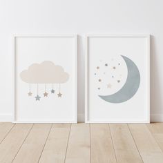 two framed pictures with stars and clouds hanging from them