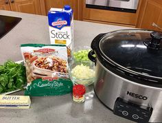 the ingredients are on the counter ready to be put into the crock pot and placed in front of the slow cooker