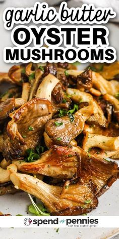 garlic butter oyster mushrooms on a white plate