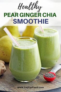 two glasses filled with green chia smoothie next to some bananas and other fruits