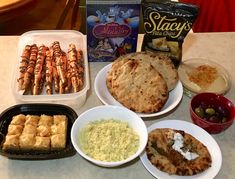 the meal is prepared and ready to be eaten on the dining room table for guests