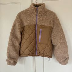 Asos Only Teddy Sherpa Jacket With Contrast Quilting In Beige, Size Medium, Brand New Beige Sherpa Outerwear For Winter, Cozy Beige Sherpa Outerwear, Beige Sherpa Outerwear For Fall, Brown Sherpa Fleece Jacket With Long Sleeves, Beige Fleece Jacket With Pockets For Cold Weather, Brown Sherpa Outerwear With Pockets, Brown Sherpa Outerwear For Cold Weather, Brown Sherpa Outerwear With Fleece Lining, Brown Sherpa Fleece Jacket With Pockets