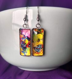 Grapevine Painting Inspired Glass Earrings Artistic bold statement earrings, a perfect gift and choice for any occasion. Ideal gift for an artist. Chic and Unique. Measures 25 mm in length and 10 mm in width. Comes with First Class Free shipping. Colors may vary due to monitor and lighting differences. Artistic Single Earring For Gift, Multicolor Single Earring Jewelry Gift, Multicolor Single Earring As Gift, Rectangular Summer Earrings As Gift, Multicolor Dangle Earrings For Mother's Day, Multicolor Earrings For Mother's Day Gift, Multicolor Cadmium-free Earrings For Gift, Artsy Summer Jewelry As A Gift, Artistic Multicolor Summer Jewelry