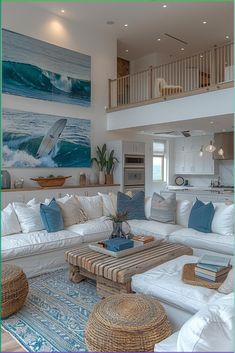 a living room filled with lots of white furniture