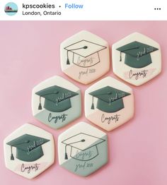 four decorated cookies with graduation caps and tassels on them are arranged in the shape of hexagons