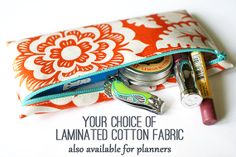 an orange and white flowered pouch with personal care items in it that says your choice of laminated cotton fabric also available for planners