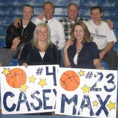 a group of people holding a sign that says case max