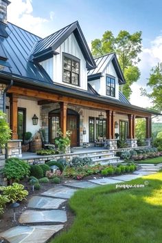 a large house with lots of windows and landscaping