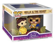 the beauty and the beast pop vinyl figure set is shown in its box, with an open