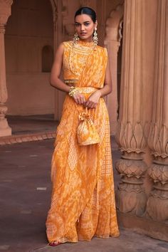 Mustard pre-draped sharara saree with thikri and floral print. Comes with a sequins work padded blouse, a belt and a potli bag. - Aza Fashions Sharara Saree, Saree Gowns, Dhoti Saree, Cotton Sarees Handloom, Potli Bag, Ruffle Saree, Padded Blouse, Drape Saree, Lehenga Saree