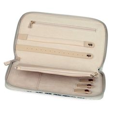 Keep organized with this Karla Hanson Eva jewelry organizer case. Keep organized with this Karla Hanson Eva jewelry organizer case. Unique textural interplay of textile vegan leather and raised print Multiple pockets and straps keep necklaces or chains from tangling 5"H x 8.5"W x 1.25"D Zipper closure Gold-tone plating Interior: 2 zip pockets, 1 slip pocket and 6 snap pocketsCONSTRUCTION & CARE Body: cotton, polyester, polyurethane Lining: polyester Spot clean ImportedSUSTAINABILITY FEATURES Tes Adjustable Rectangular Jewelry Storage For Travel, Jewelry Organizer, Jewelry Organization, Vegan Leather, Zip Pockets, Gold Tones, Plating, Necklaces, Zipper