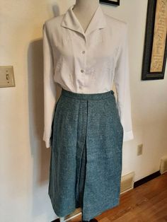 "Mid Century Womens Office/Career Wool A-Line/Pencil Skirts Size S-M/Vtg Lot 4 Wool Skirts Very Good Wearable Condition. Came From An Estate Sale And Need To Be Cleaned From Being Stored. Knee Length Or Slightly Longer Depending On Height. Fairly Soft Wool Fabric/Not Scratchy Lavender Lined Kerrybrooke Pencil Skirt Wool/Acetate Lining 1\" Waistband/Lavender 7\" Side Metal Zipper/1 Button Top Stitching and Front Kick Pleat (1 Tiny Hole Inside Pleat) Waist 27\" Hips 40\" length 26\" Black/Cream/Gr Vintage Long Skirt With Relaxed Fit, Classic Lined Skirt For Daywear, Vintage Lined Skirt For Fall, Retro Long Lined Skirt, Retro Relaxed Fit Skirt For Fall, Retro Long Skirt With Lining, Vintage Pencil Skirt With Lining, Vintage Long Lined Skirt, Vintage Fall Skirt