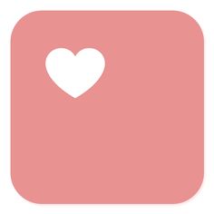 a pink square with a white heart on it