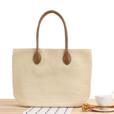 This bag is stylish and very pretty. It is a classic, elegant solid color design.Whether you are out shopping, going to the pool or the beach, this tote bag is the perfect accessory. Spacious enough for carrying any and all of your seaside essentials. Straw Beach Tote, Straw Beach Bag, Straw Tote Bag, Top Handle Handbags, Straw Tote, Trend Style, Shopping Tote Bag, Shopper Tote, Beach Tote Bags