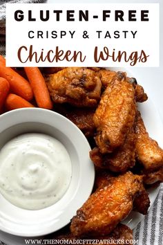 chicken wings with ranch dip and carrots on the side text reads gluten - free crispy & tasty chicken wings