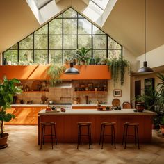 an orange kitchen with lots of plants and potted plants on the counter top, along with two bar stools