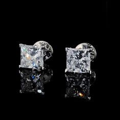 2ctw or 4ctw Princess Cut Lab Grown Diamond Earrings in Tulip Setting ---------------------------------------------------- ⁕Diamond Type: Lab Grown Diamonds ⁕Shape: Princess Cut ⁕Total Carat Weight: 2ctw or 4ctw (choose in dropdown menu) ⁕Center Stone Weight: 1ct. each or 2ct. each ⁕Color: DEF (colorless) ⁕Clarity: VS/VVS (eye clean) ⁕Certified: Yes ⁕Metal: 14k Yellow/Rose/White  ⁕Style: Push Back or Screw back  ------------------------------------------------------------ This item can be custom Luxury Princess Cut Earrings, Classic Princess Cut Diamond Earrings In Sterling Silver, Classic Princess Cut Sterling Silver Diamond Earrings, Classic White Princess Cut Earrings, Classic Princess Cut Diamond White Earrings, Platinum Earrings With Vs Clarity For Formal Occasions, Classic Princess Cut Earrings, Classic Platinum Bridal Earrings With Diamond Cut, Classic Silver Princess Cut Earrings