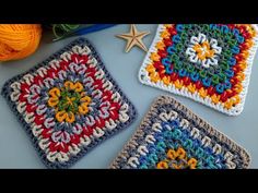 three crocheted squares are sitting next to each other