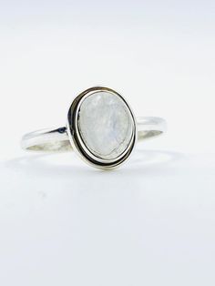 Moonstone ~ Sterling Silver 925 ~ Handmade ~ Gemstone ~ Statement ~ Everyday ~ Oval stone ~ Hippie ~Bohemian~June Birthstone 》D E T A I L S《 ✦ M E T A L : Sterling Silver 925 ✦ S T O N E : Moonstone ✦ B I R T H S T O N E : June ( Moonstone ) 💎 Because of the name, this stone always had a strong connection with the magic of the moon. The moonstone is known as a protection for travelers, a gift of love & passion and a path to wisdom. ✧ Please note natural gemstones are unique and may vary in shape or color. ✧ Minimalist Silver Moonstone Ring, Minimalist Silver Moonstone Ring With Natural Stones, Oval Moonstone Natural Stones, Oval Natural Moonstone Gemstones, Everyday Jewelry With Oval Natural Stones, Everyday Oval Jewelry With Natural Stones, Everyday Oval Natural Stone Jewelry, Bohemian Oval Moonstone Jewelry, Oval Moonstone Jewelry For Everyday