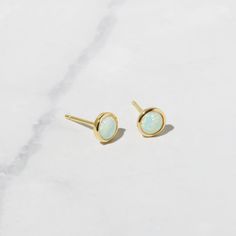 These opal studs are super cute and dainty! They are perfect for first piercings and stack nicely with other earrings! Made of 925 Sterling Silver Available in 14k Gold, Rhodium or Rose Gold plated. We use a THICK plating for a piece that will last you years to come! Sold as a Pair Measures 6.5 mm Push Back Closure Hypoallergenic and nickel free Made of lab created opal, we use the highest grade for an authentic look! Minimalist Hypoallergenic Opal Earrings, Dainty Hypoallergenic Opal Earrings, Dainty Round Opal Earrings, Minimalist Opal Earrings, Opal Stud Earrings, Opal Earrings Stud, Opal Studs, Opal Earrings, Dainty Earrings