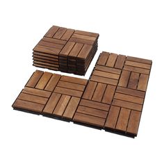 several pieces of wood sitting on top of each other in the shape of square tiles