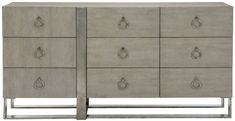 the sideboard is made out of wood and has metal handles