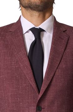 Chalky slubbing subtly relaxes a suit tailored from a blend of wool and linen with classic details extending from the notched lapels to the flat-front trousers. Jacket has notched lapels; four-button cuffs; chest pocket; flap pockets; interior pockets; side vents Trousers have zip fly with button-tab closure; slant pockets; back button-welt pockets Jacket is lined; trousers are lined to the knee 90% wool, 10% linen Dry clean Imported Tailored Linen Suit With Suit Collar, Semi-formal Linen Suit With Pressed Crease, Linen Suits With Pressed Crease For Semi-formal Events, Single Button Linen Suits For Office, Fitted Linen Suit With Single Button, Fitted Linen Suits With Single Button, Tailored Linen Suits With Welt Pockets, Tailored Linen Suit With Pressed Crease, Classic Linen Suit With Single Button