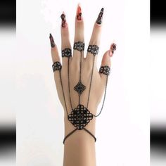 Chain Bracelet/ Ring Combination Henna Style All The Rings Are Adjustable Tags Goth Gothic Emo Punk Edgy Retro Vintage Festival Concert Kawaii Club Rave Bohemian Boho Hippy Hippie Modern Contemporary Beach Summer Travel Vacation Trendy Trending Casual 60s 70s 80s 90s 00s Y2k Hot Topic Dolls Kill Iron Fist Blackmilk Tripp Current Mood Native Belly Dancer Indian India Middle Eastern Middle East Coastal Cosplay Costume Halloween Party Edgy Silver Metal Body Jewelry, Punk Style Metal Body Jewelry With Chain, Adjustable Gothic Jewelry For Party, Edgy Adjustable Body Jewelry For Parties, Adjustable Edgy Body Jewelry For Parties, Edgy Bangle Jewelry Gift, Adjustable Metal Punk Jewelry, Gothic Metal Chain Body Jewelry, Black Metal Body Jewelry With Adjustable Chain