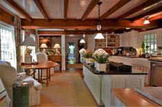 the kitchen is clean and ready to be used as a living room or dining area