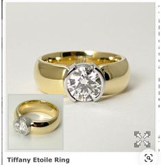 two gold wedding rings with a diamond in the middle and an image of a ring on top