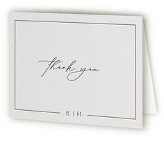 a thank card with the word,'thank you'in cursive writing