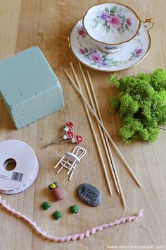 various crafting supplies are displayed on a table