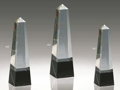 three crystal obelis with different angles and sizes