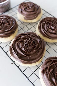 cookies with chocolate frosting on a cooling rack