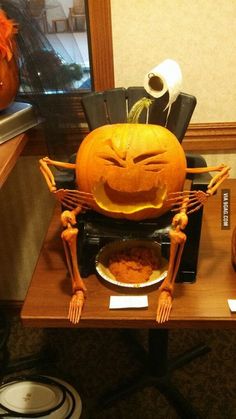 a carved pumpkin sitting on top of a table