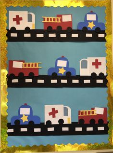 a bulletin board with cars and trucks painted on the sides, along with gold foil