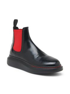 The McQueen Chelsea Platform Boot - a standout staple reimagined. Italian leather, rounded toe and vibrant elastic panels update this iconic style with an elevated lift, perfect for rocking any look with signature edge and comfort. #McQueenBoots High-top Leather Chelsea Boots With Contrast Sole, High-top Chelsea Boots With Contrast Sole, Chelsea Boots With Contrast Sole And Calf Leather, Calf Leather Chelsea Boots With Contrast Sole, Modern Boots With Red Sole And Round Toe, High-top Leather Platform Boots With Rubber Heel Cap, Leather High-top Platform Boots With Rubber Heel Cap, Modern Slip-on Boots With Contrast Sole, Leather Boots With Contrast Sole And Medium Width