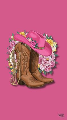 a pink cowboy hat and boots with flowers on the ground in front of a pink background