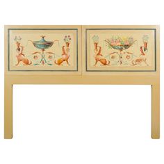 two paintings on the side of a wooden headboard with animals and flowers painted on it