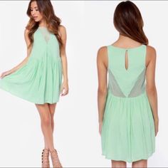 Mesh Insert Flowy Mini Dress Mint Green Size Xs, Christina Perri Collaboration From 2014 Product Details: "Angular Mesh Inserts Amp Up The Edge For A Minty Trapeze Dress Detailed With A Gathered, Pointed Waist." Condition: Nwt. Some Light Discoloration At Neckline And Armholes. Also On Top Of Straps. Shown In Last 5 Clothing Photos. Seems To Be Makeup And Most Likely Washable. I Have Not Tried To Clean It, Because It Still Has The Tags Attached. Priced Accordingly. Material: 100% Viscose With 50 Mint Flowy Dress, Mesh Insert Dress, Minkpink Dress, White Halter Dress, Revolve Dresses, Christina Perri, Born Free, Mint Dress, Flowy Mini Dress