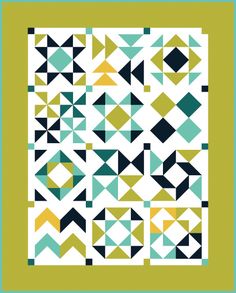 a green and white quilt with triangles on it