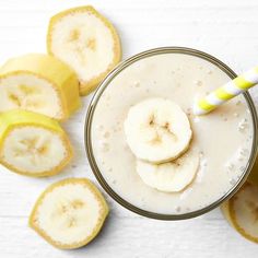 a banana smoothie with sliced bananas on the side