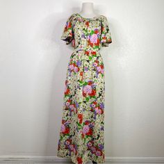 Vintage Goldworm 1960s Maxi Dress Vintage Size 8 Multi Color Floral Print Short Sleeves Zip Back Closure Made In Italy 100% Polyester Bust 15.5” Across, Waist 12” Across, Shoulder To Bottom Hem 53” Pre Owned, Good Condition. No Holes Or Stains. Small Snag In The Fabric. Please Refer To Pictures. |All Measurements Are Approximate| (Purple) 1960s 1970s Floral Vintage Cottagecore Prairie Country Chic Whimsy Fairycore Maxi Dress Vintage, Vintage Cottagecore, Vintage Maxi Dress, Floral Print Shorts, Floral Vintage, Country Chic, Dress Vintage, Red Purple, Vintage Dresses