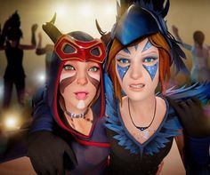 two women dressed in costumes and masks pose for the camera