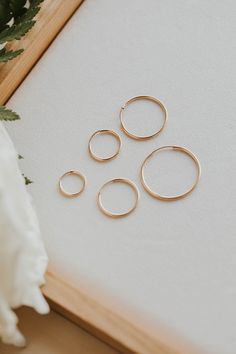 We love the simplicity of these subtle hoops. These work as great second or third piercing staples, but these classic hoops can hold down the fort all on their own! Sold as a pair in 12mm, 14mm, 16mm, 20mm, and 25mm. Endless Hoop How-To: To open the hoop, gently pull the wire post out of the tube. Shift the two ends of the hoop sideways (apart from each other) to fit around your lobe. Then, insert the thinner wire into the front side of your piercing. Once it’s in, gently pull apart to get the w Classic Small Stackable Hoop Earrings, Nickel-free Minimalist Huggie Septum Ring, Classic Round Stackable Hoop Earrings, Classic Small Hoop Rings For Everyday, Minimalist Internally Threaded Everyday Huggie Earrings, Minimalist Internally Threaded Huggie Earrings For Everyday, Everyday Minimalist Internally Threaded Huggie Earrings, Nickel Free Minimalist Hoop Septum Ring, Minimalist Nickel-free Hoop Septum Ring