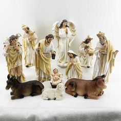 a group of figurines depicting the birth of jesus